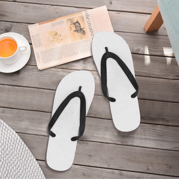 A pair of white customizable flip flops