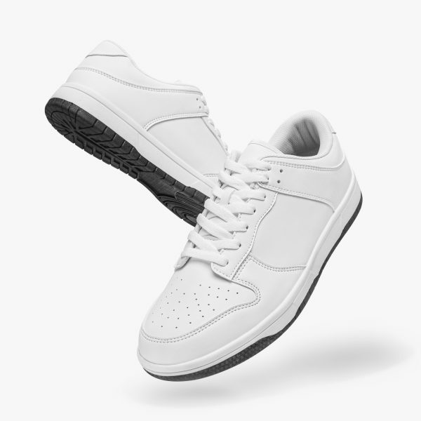 A pair of white customizable low-top leather shoes