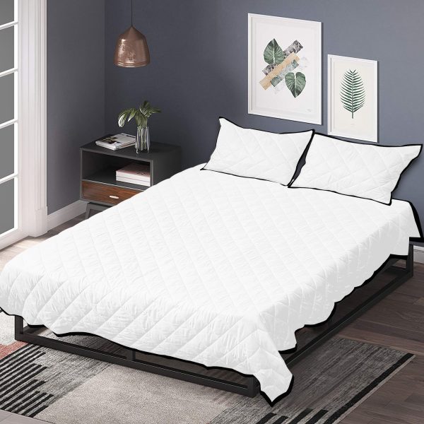 A collection of white customizable quilt covers