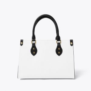 A women's white leather tote bag